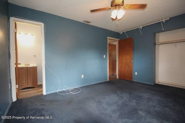 6275 Casson St, Brooksville, FL 34604 - unfurnished bedroom with carpet flooring, ensuite bath, and ceiling fan