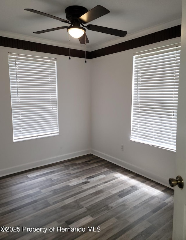 18499 Shady Side Dr, Brooksville, FL 34601 - unfurnished room featuring crown molding, ceiling fan, wood finished floors, and plenty of natural light