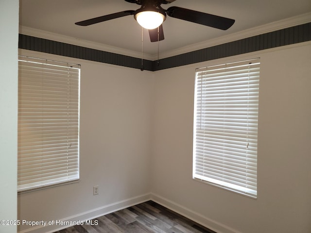 18499 Shady Side Dr, Brooksville, FL 34601 - spare room with a ceiling fan, wood finished floors, crown molding, and healthy amount of natural light