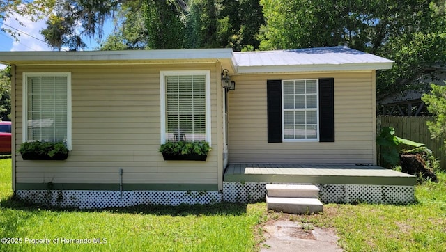 18499 Shady Side Dr, Brooksville, FL 34601 - view of property exterior featuring a wooden deck