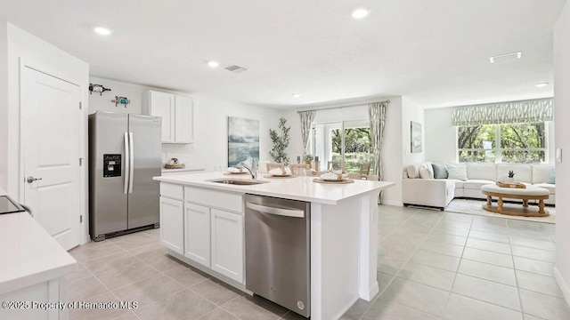 7163 N Folgers Ter, Dunnellon, FL 34433 - kitchen featuring stainless steel appliances, plenty of natural light, open floor plan, light tile patterned floors, and recessed lighting