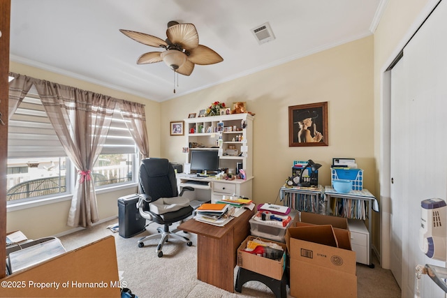 13027 Beacon Ct, Hudson, FL 34667 - home office featuring light carpet, ornamental molding, and a ceiling fan