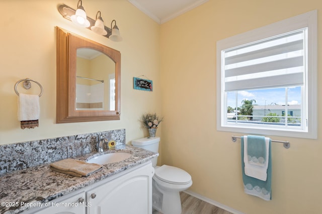 13027 Beacon Ct, Hudson, FL 34667 - full bathroom with vanity, ornamental molding, wood finished floors, and a shower