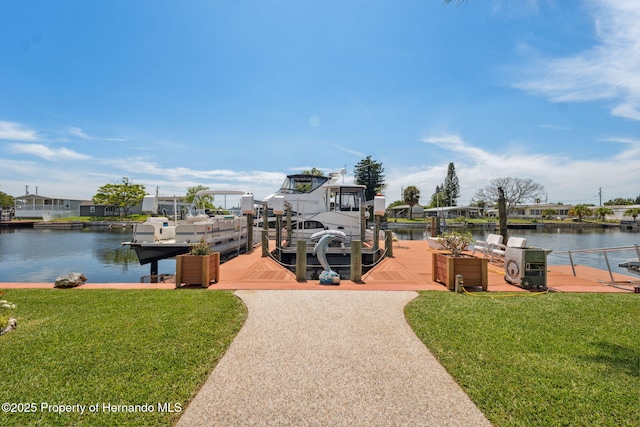 13027 Beacon Ct, Hudson, FL 34667 - dock area with a yard and a water view