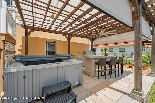 13027 Beacon Ct, Hudson, FL 34667 - view of patio / terrace with an outdoor kitchen, a ceiling fan, and a pergola