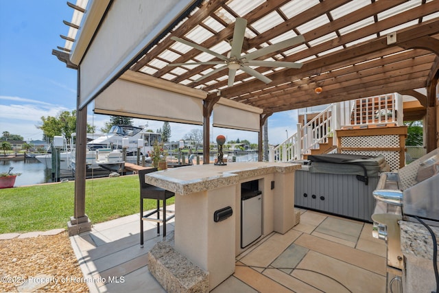 13027 Beacon Ct, Hudson, FL 34667 - view of patio featuring an outdoor bar, a water view, stairway, a ceiling fan, and boat lift