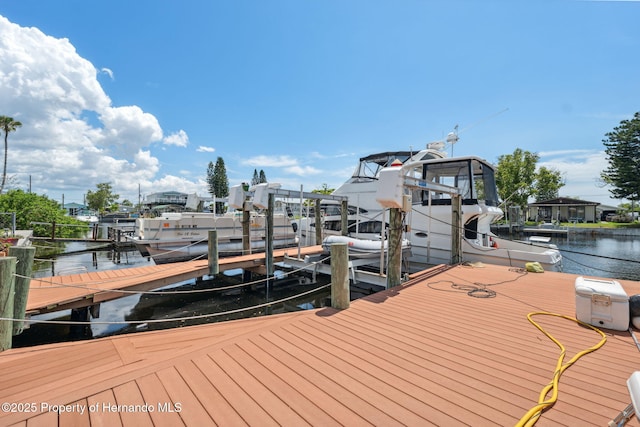 13027 Beacon Ct, Hudson, FL 34667 - dock area featuring boat lift and a water view
