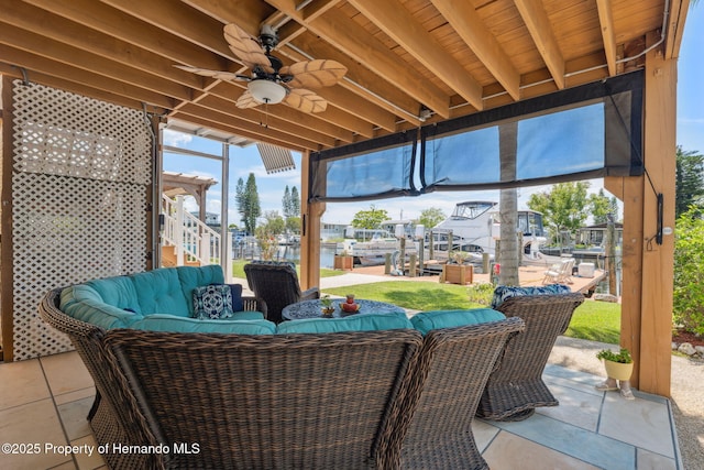 13027 Beacon Ct, Hudson, FL 34667 - sunroom with a ceiling fan and an outdoor living space