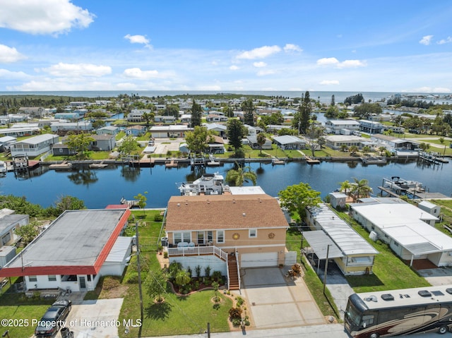 13027 Beacon Ct, Hudson, FL 34667 - aerial view of residential area featuring a large body of water