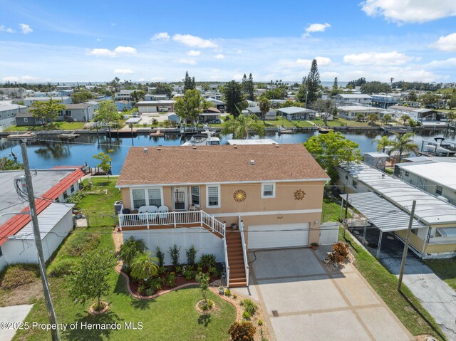 13027 Beacon Ct, Hudson, FL 34667 - aerial perspective of suburban area featuring a nearby body of water