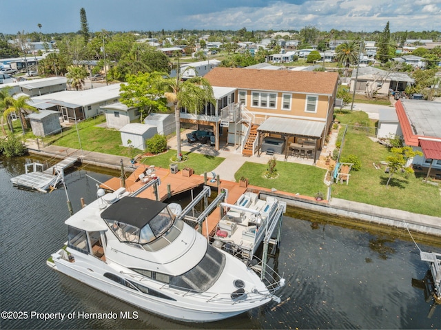 13027 Beacon Ct, Hudson, FL 34667 - aerial perspective of suburban area featuring a nearby body of water