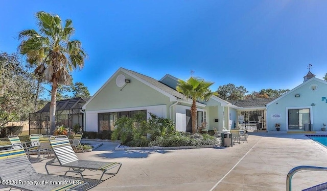 9474 Nakoma Way, Weeki Wachee, FL 34613 - community pool featuring a patio area