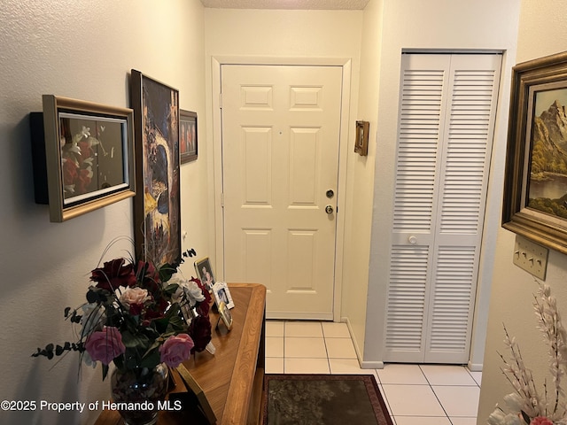 9474 Nakoma Way, Weeki Wachee, FL 34613 - foyer with light tile patterned flooring