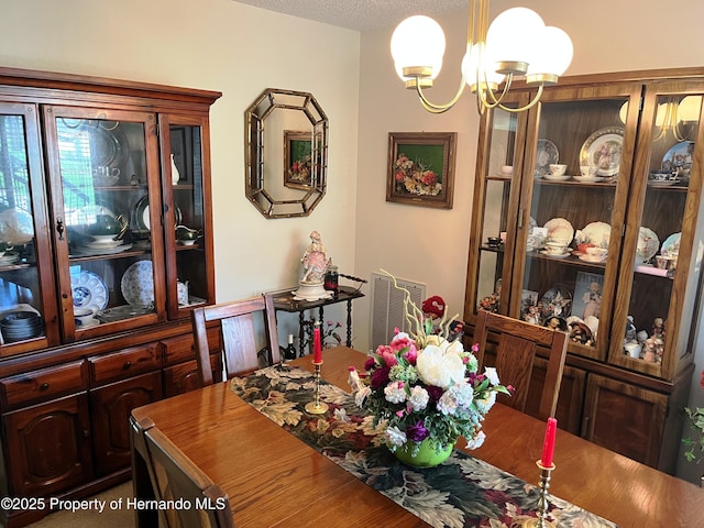 9474 Nakoma Way, Weeki Wachee, FL 34613 - dining room featuring a chandelier