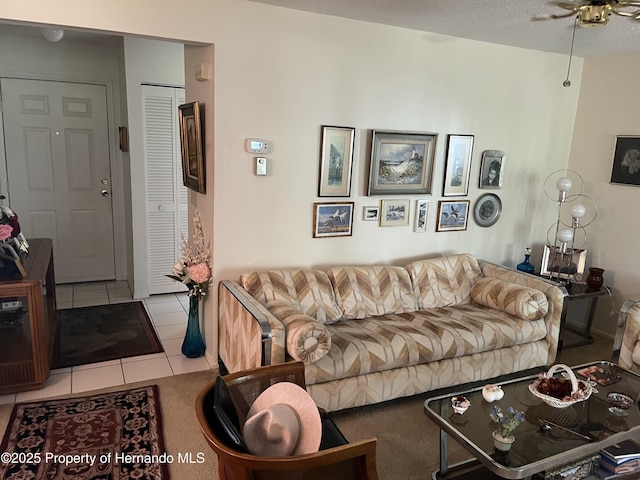 9474 Nakoma Way, Weeki Wachee, FL 34613 - tiled living area featuring ceiling fan