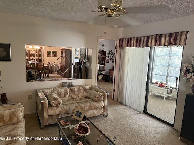 9474 Nakoma Way, Weeki Wachee, FL 34613 - carpeted living room featuring a ceiling fan and a textured ceiling