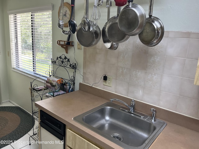 9474 Nakoma Way, Weeki Wachee, FL 34613 - kitchen featuring healthy amount of natural light and tile patterned flooring