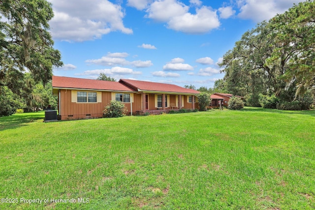 20480 Lake Lindsey Rd, Brooksville, FL 34601 - view of front facade featuring crawl space, a front lawn, and a porch