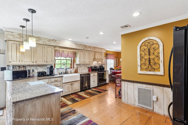 20480 Lake Lindsey Rd, Brooksville, FL 34601 - kitchen with freestanding refrigerator, stainless steel dishwasher, electric range oven, light wood finished floors, and ornamental molding