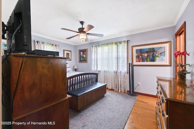 20480 Lake Lindsey Rd, Brooksville, FL 34601 - bedroom with light wood finished floors, crown molding, and ceiling fan
