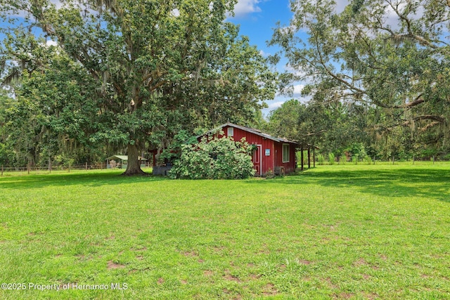 20480 Lake Lindsey Rd, Brooksville, FL 34601 - view of green lawn featuring an outdoor structure