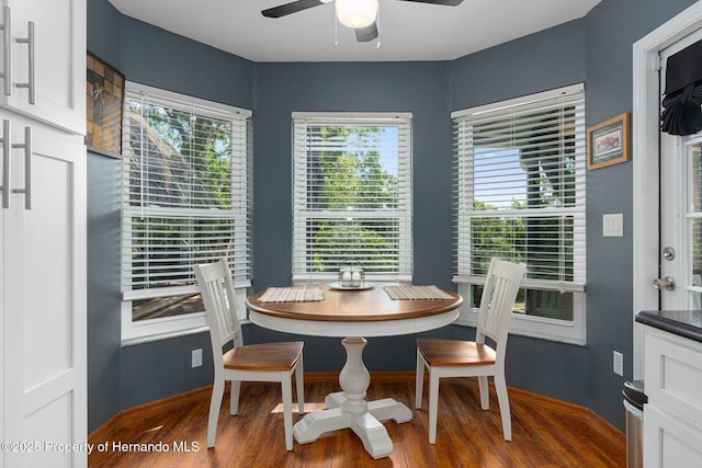 2295 Rio Cir, Spring Hill, FL 34608 - dining space with a ceiling fan and wood finished floors