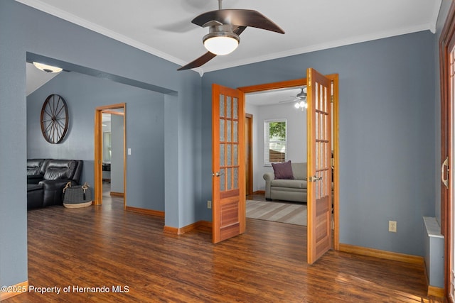 2295 Rio Cir, Spring Hill, FL 34608 - unfurnished room featuring french doors, ceiling fan, wood finished floors, and crown molding