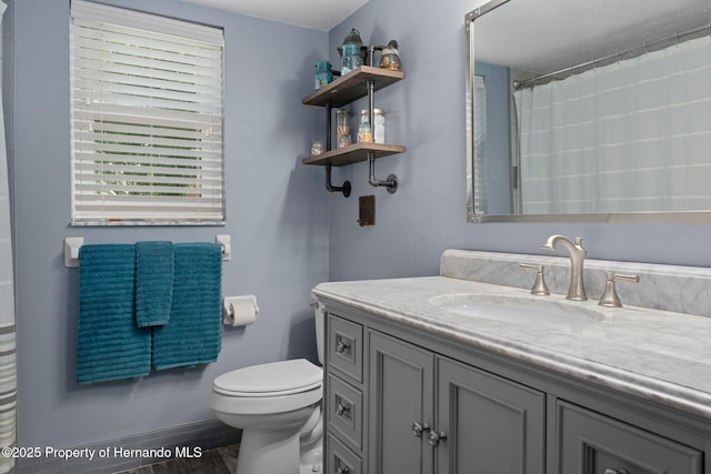 2295 Rio Cir, Spring Hill, FL 34608 - bathroom with vanity and a shower with shower curtain