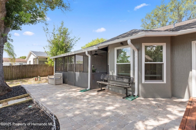 2295 Rio Cir, Spring Hill, FL 34608 - view of patio featuring a sunroom and ceiling fan