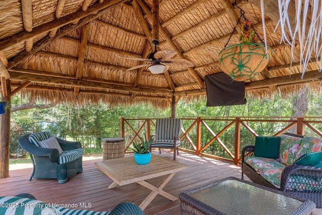 2295 Rio Cir, Spring Hill, FL 34608 - deck with a gazebo, ceiling fan, and an outdoor living space