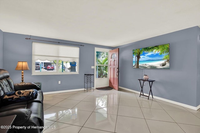 13332 Lisa Dr, Hudson, FL 34667 - living area with baseboards and light tile patterned flooring