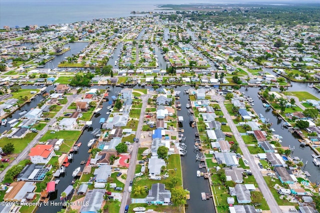 13332 Lisa Dr, Hudson, FL 34667 - aerial overview of property's location with a large body of water and nearby suburban area