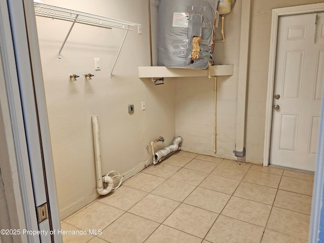 18232 Monteverde Dr, Spring Hill Pasco, FL 34610 - washroom with electric dryer hookup and tile patterned floors