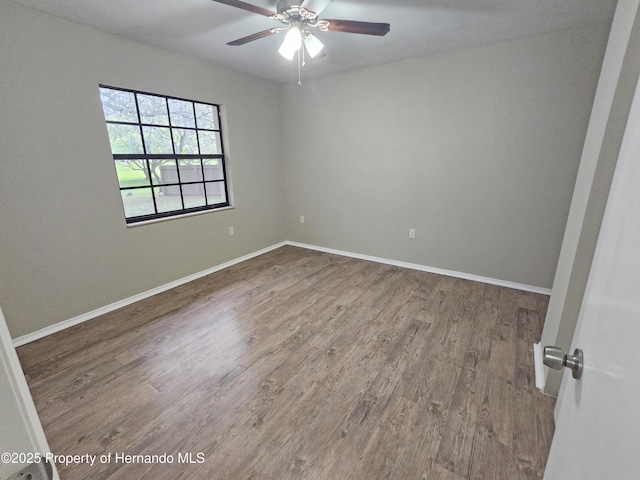 18232 Monteverde Dr, Spring Hill Pasco, FL 34610 - unfurnished room with wood finished floors and ceiling fan