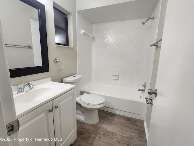 18232 Monteverde Dr, Spring Hill Pasco, FL 34610 - bathroom with wood finished floors, vanity, and bathtub / shower combination