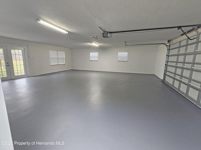 18232 Monteverde Dr, Spring Hill Pasco, FL 34610 - garage with french doors and a garage door opener