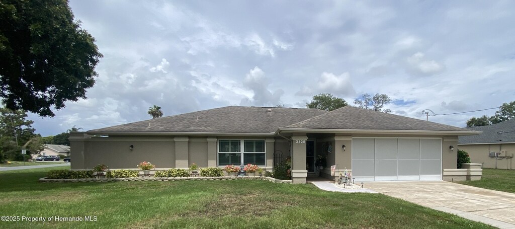 3128 Montague Ave, Spring Hill, FL 34608 - photo 1