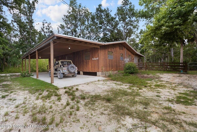 1518 Palm St, Steinhatchee, FL 32359 - exterior space with a carport