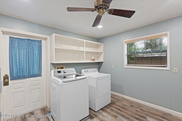 1518 Palm St, Steinhatchee, FL 32359 - washroom with washing machine and dryer, wood finished floors, ceiling fan, a textured ceiling, and ornamental molding