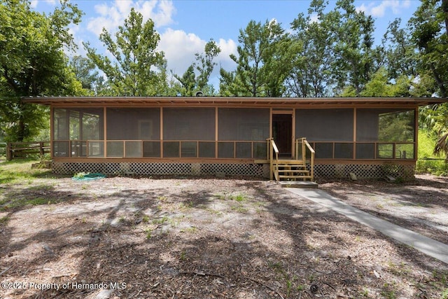 1518 Palm St, Steinhatchee, FL 32359 - view of front of home featuring a sunroom