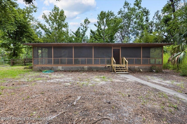 1518 Palm St, Steinhatchee, FL 32359 - view of front of house featuring a sunroom