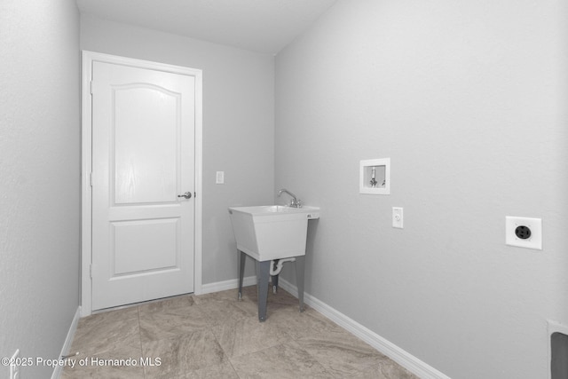 12128 Petrel Ave, Brooksville, FL 34614 - laundry area featuring hookup for an electric dryer and washer hookup