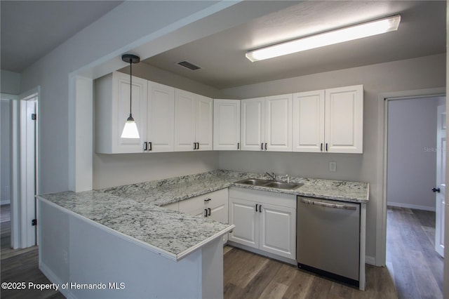 9345 N Elliot Way, Citrus Springs, FL 34434 - kitchen with dishwasher, white cabinetry, dark wood-type flooring, and light countertops