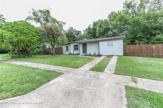 9345 N Elliot Way, Citrus Springs, FL 34434 - ranch-style home with stucco siding and driveway