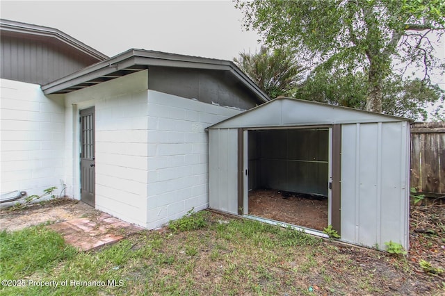 9345 N Elliot Way, Citrus Springs, FL 34434 - garage with a shed