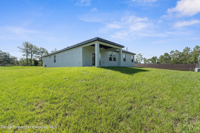 16113 Penn State Rd, Weeki Wachee, FL 34614 - rear view of house with stucco siding