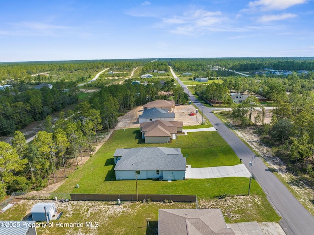 16113 Penn State Rd, Weeki Wachee, FL 34614 - aerial perspective of suburban area with a forest