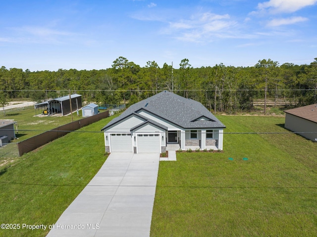 16113 Penn State Rd, Weeki Wachee, FL 34614 - ranch-style home with concrete driveway, a wooded view, a garage, and stone siding