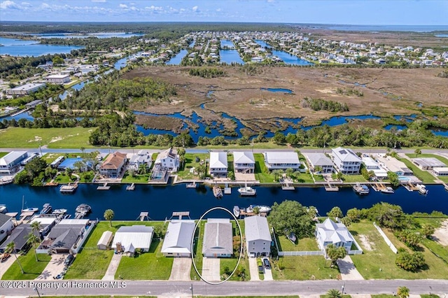 4016 Centavo Ct, Hernando Beach, FL 34607 - aerial view of property's location with nearby suburban area and a large body of water