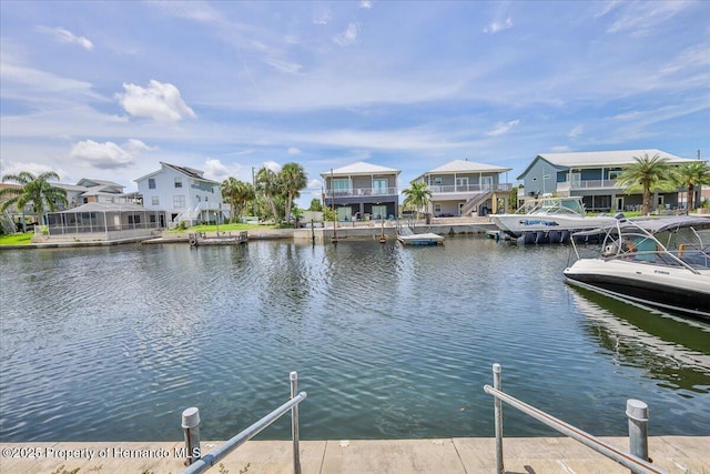4016 Centavo Ct, Hernando Beach, FL 34607 - dock featuring a residential view and a water view